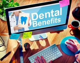a person searching their dental benefits online 