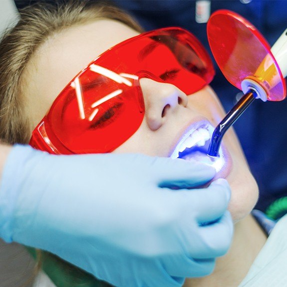 Patient receiving dental bonding