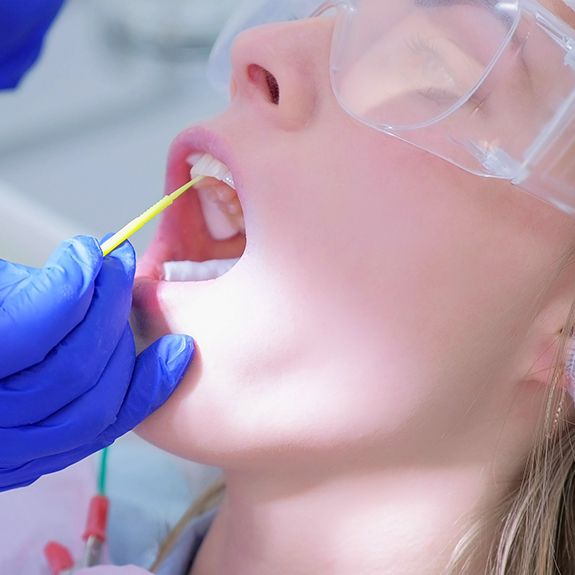 patient getting fluoride treatment 