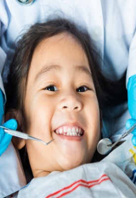 We have a board-certified pediatric dentist on staff near Fate