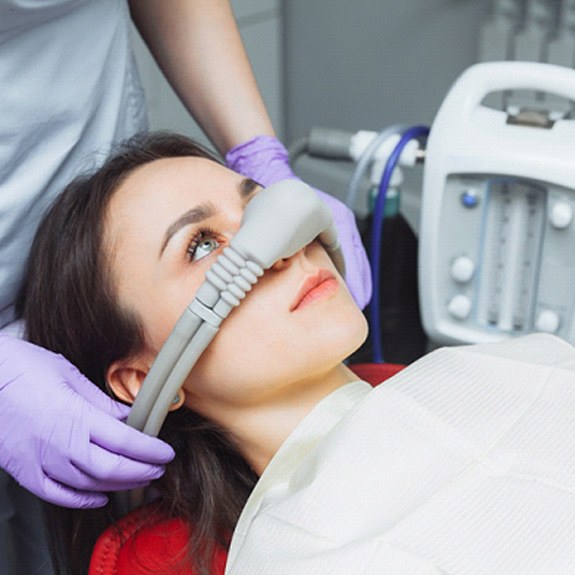 A woman receiving treatment from a sedation dentist in Royce City