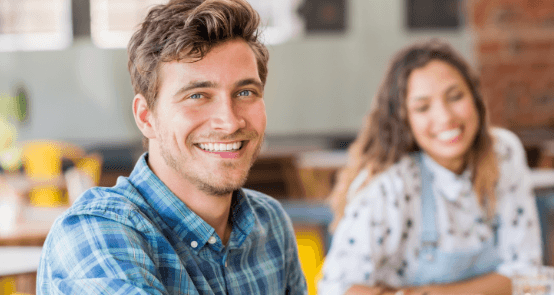 Man with attractive smile after cosmetic dentistry