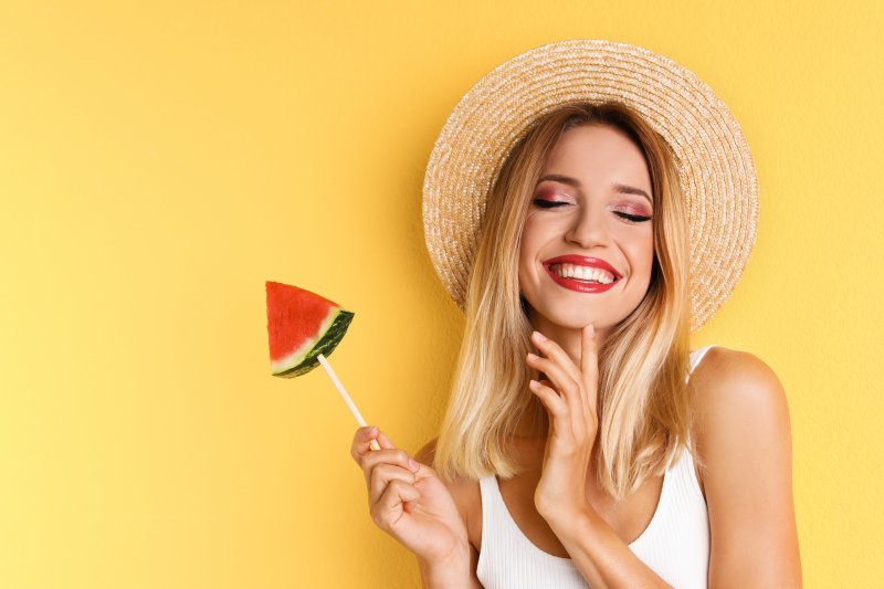 girl smiling after using healthy summer tips