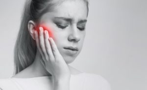 woman suffering from toothache