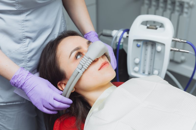 patient hooked up to a nitrous oxide mask